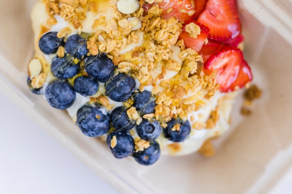 Waffle with granola, blueberries, and strawberries from the Freckled Peach