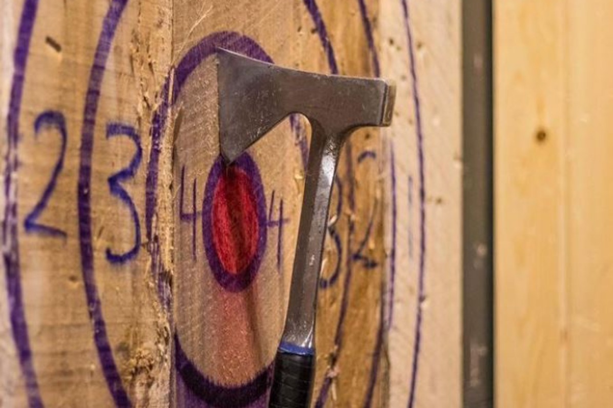 Ax hitting the bullseye at Blue Ox Axe Throwing in Oregon City