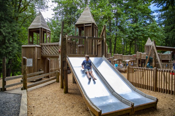 Child going down a slide at Meinig Park in Sandy, Oregon