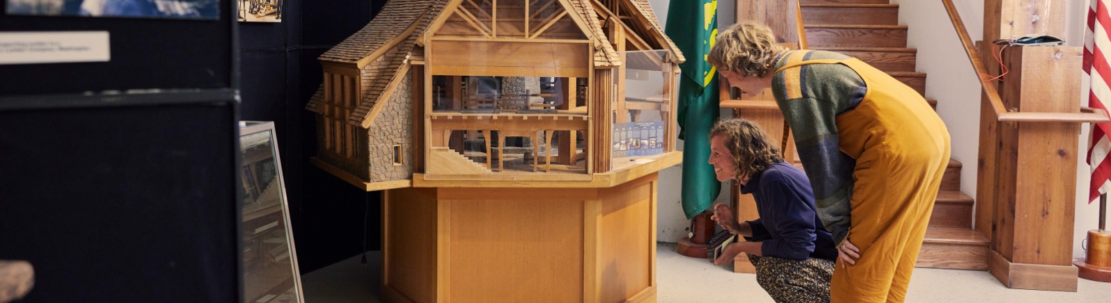 Guests look at exhibits at the Mt. Hood Cultural Center and Museum