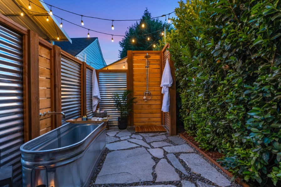 Outdoor tub, shower and twinkle lights 