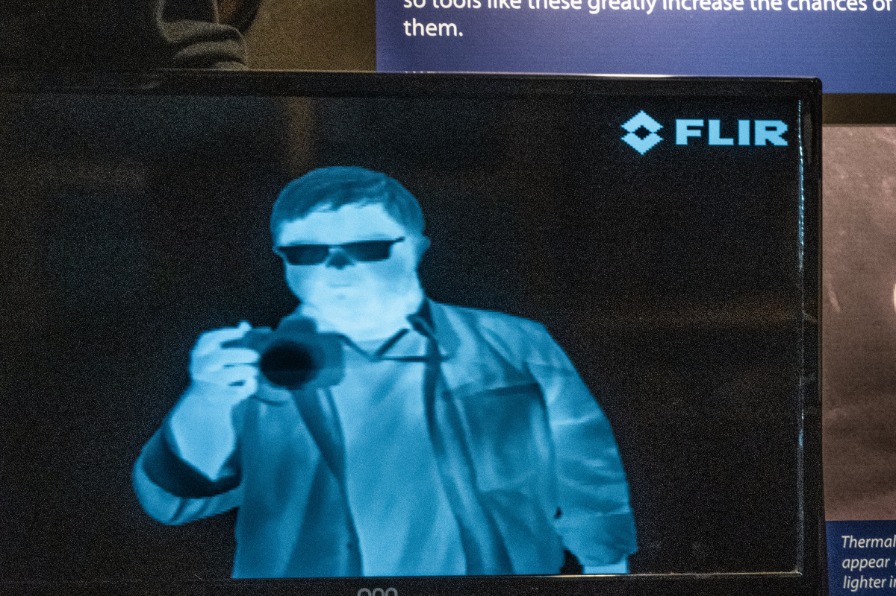 A person looks blue from the image on the tv screen
