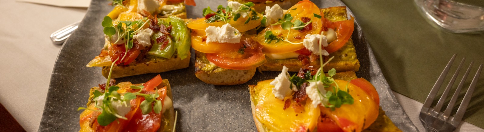 Colorful yellow, red and green crackers on a plate