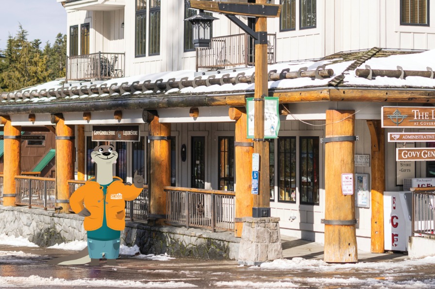 A cartoon otter stands outside a building