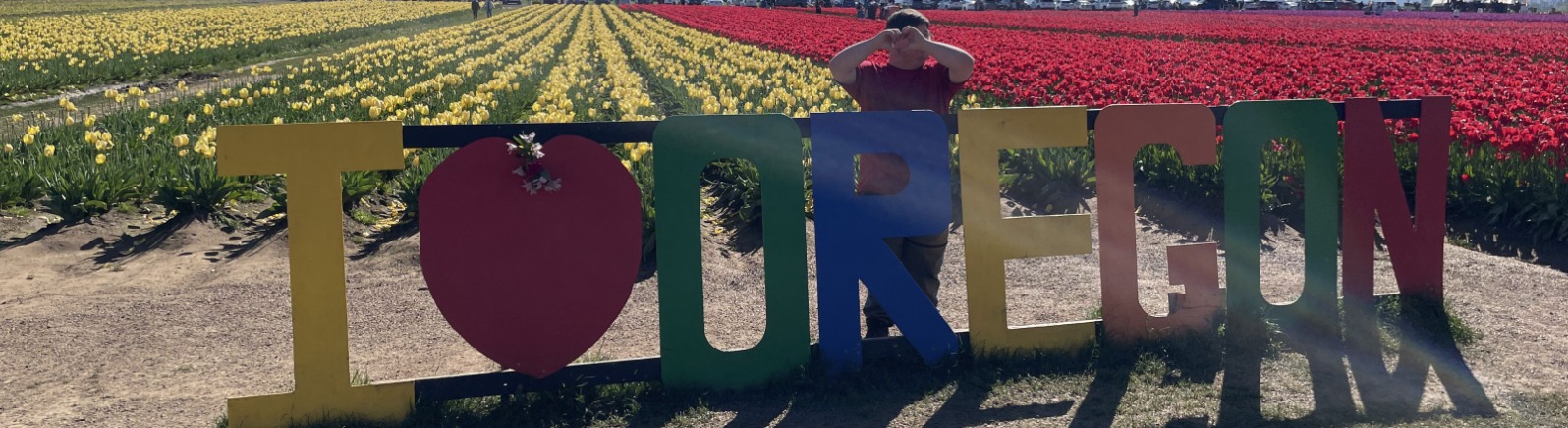 A person stands with words that read OREGON