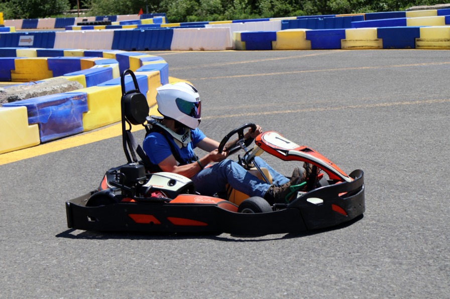 A go-kart with a driver