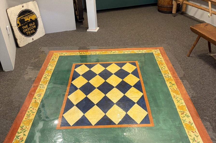 A colorful carpet on the floor