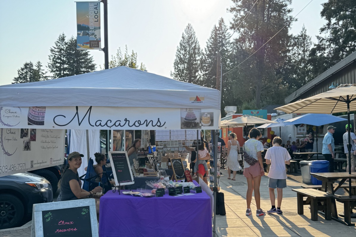 Tented macarons vendors at an outdoor market