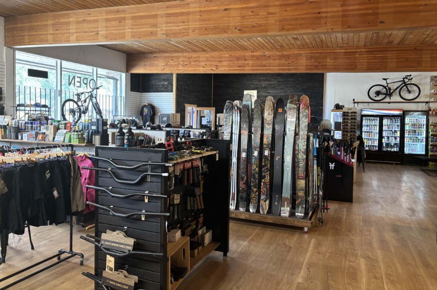 Inside of a shop with skis and bikes