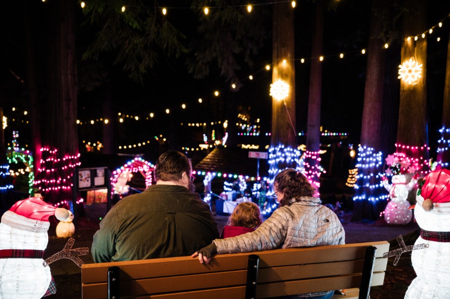 Sandy Winterfest Three people look at holiday lights