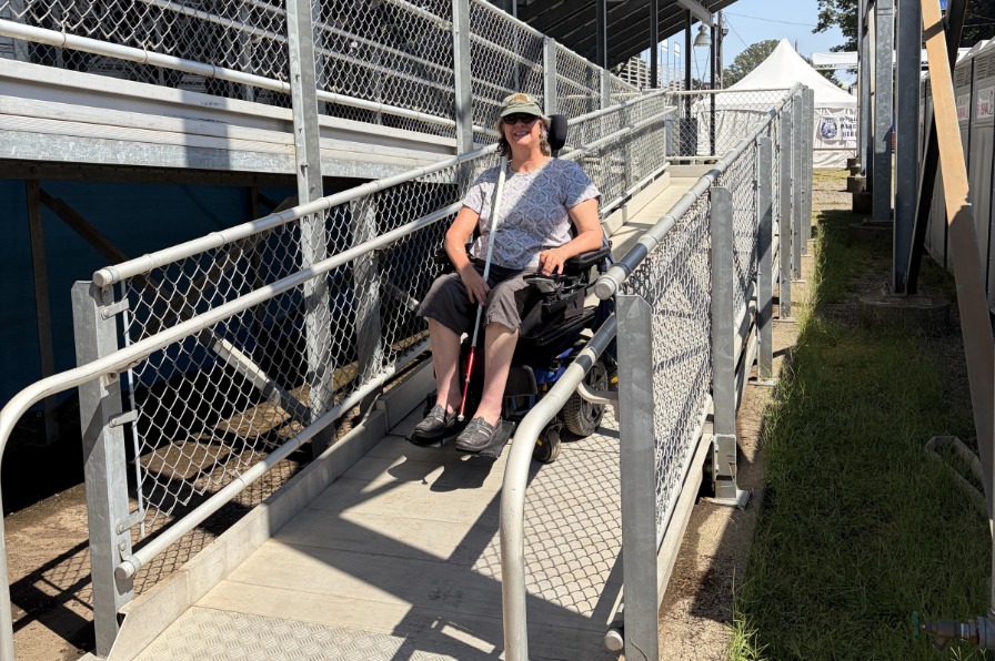 The Canby Rodeo A wheelchair user on a ramp to grandstands