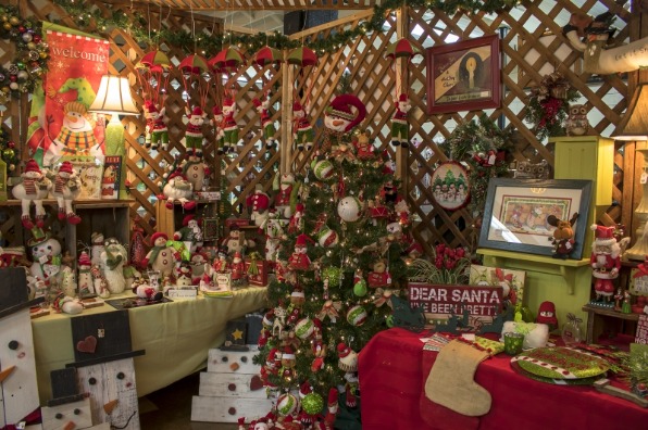 One-of-a-kind snowmen and parachuting Santas are front and center for purchase from this vendor booth at the holiday bazaar