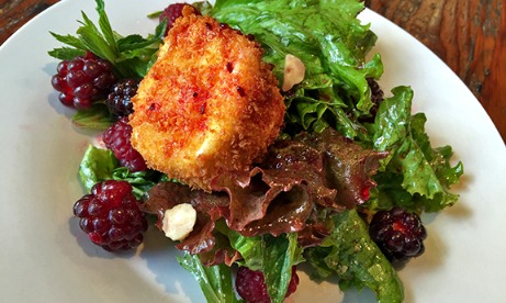 Cooking class salad with leafy greens and boysenberries at The Kitchen at Middleground Farms in Wilsonville